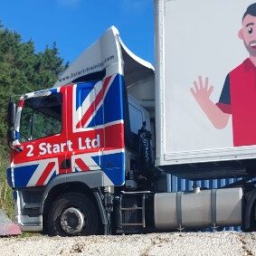 Union Jack Category C+E Lorry next to orange cone